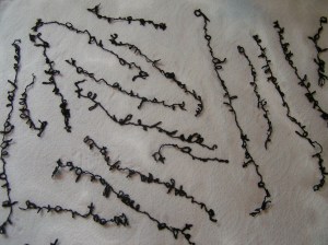 stitched poem drying